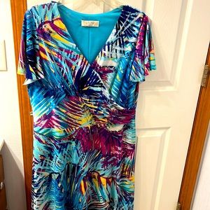 Bright pull on dress, flattering cut, bell short sleeves, midi, tropical print